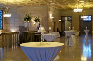 Wedding cocktail hour setup in ballroom lobby at Stambaugh Auditorium